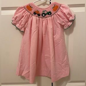 Southern Sunshine Smocked Pumpkin Patch Pink Dress. EUC- worn once. 12m